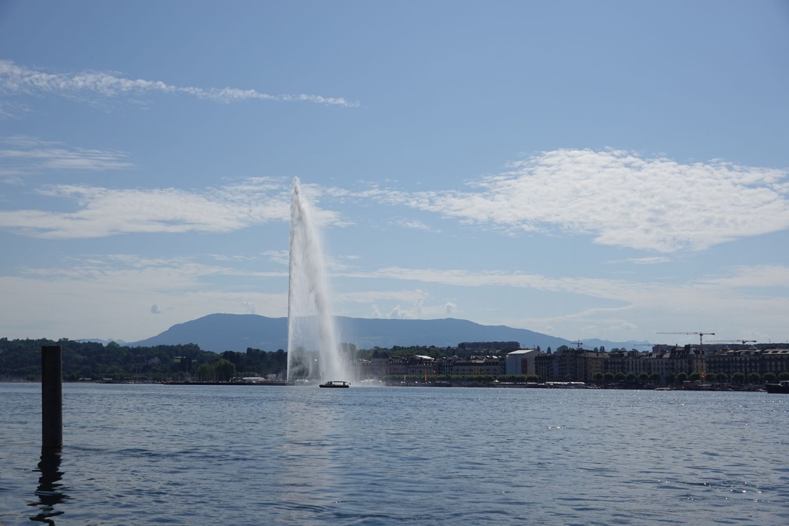 Jet d'Eau fountain rising over Lake Geneva