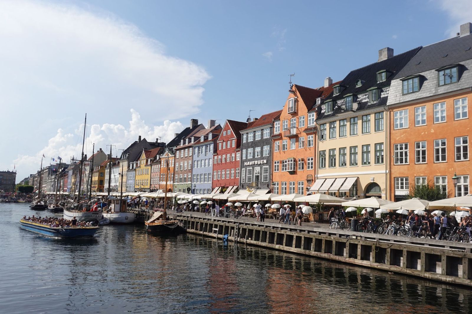 Colorful townhouses and boats along Nyhavn canal